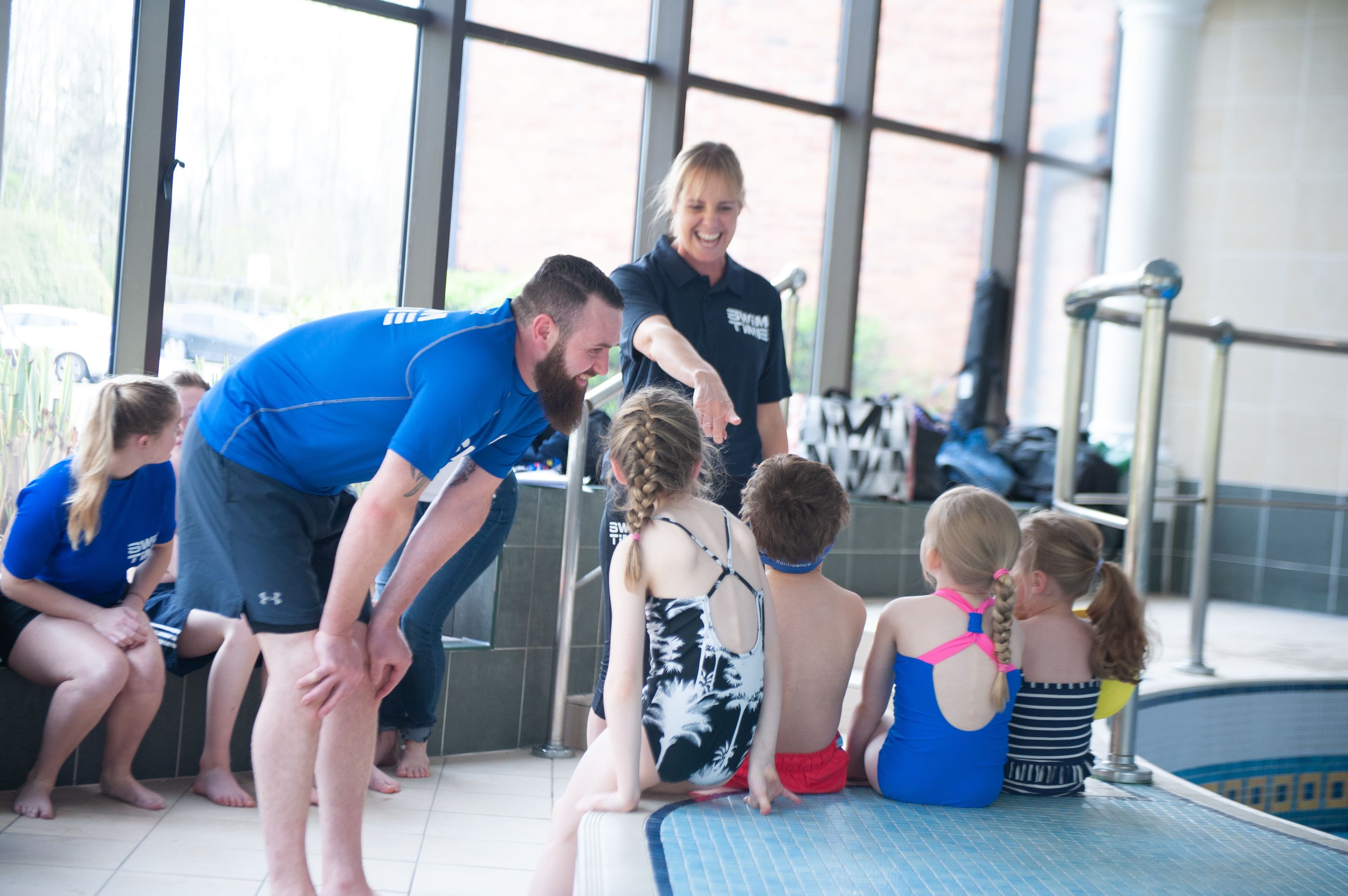 Children listening to Swimming Instructor