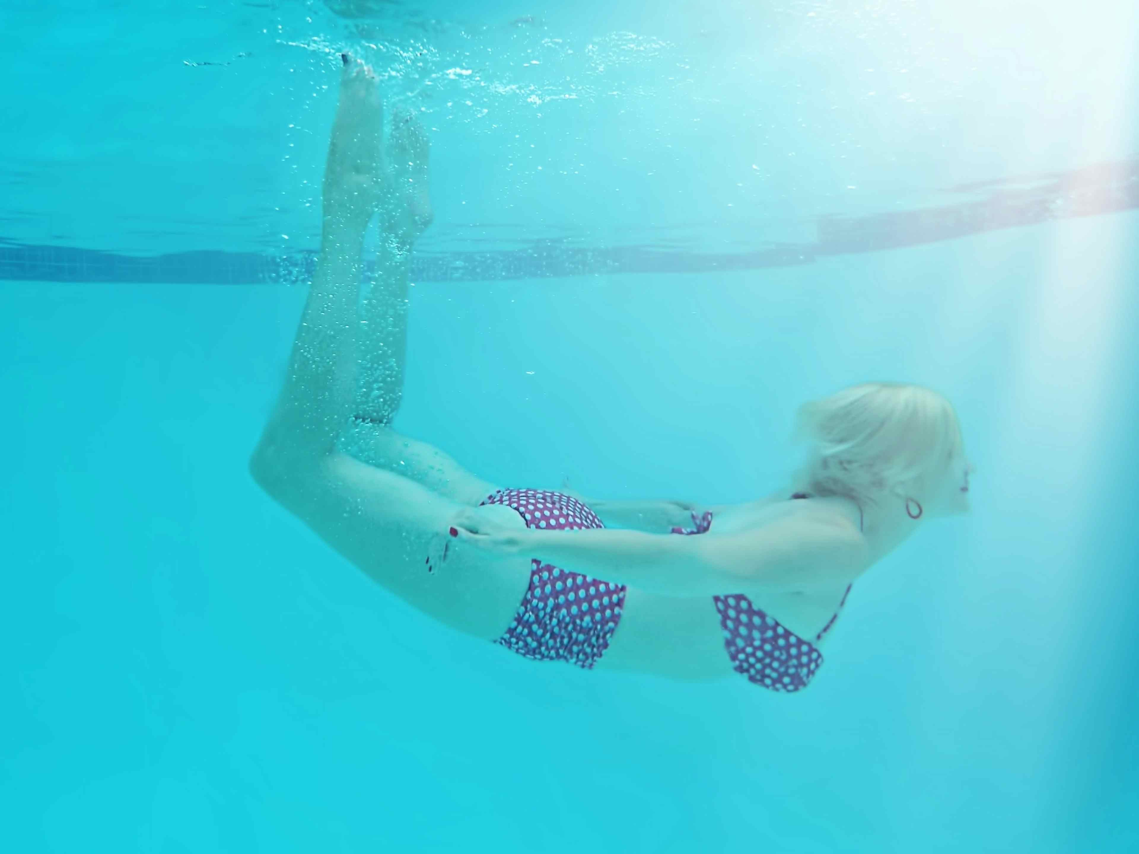 Picture of underwater swimming woman