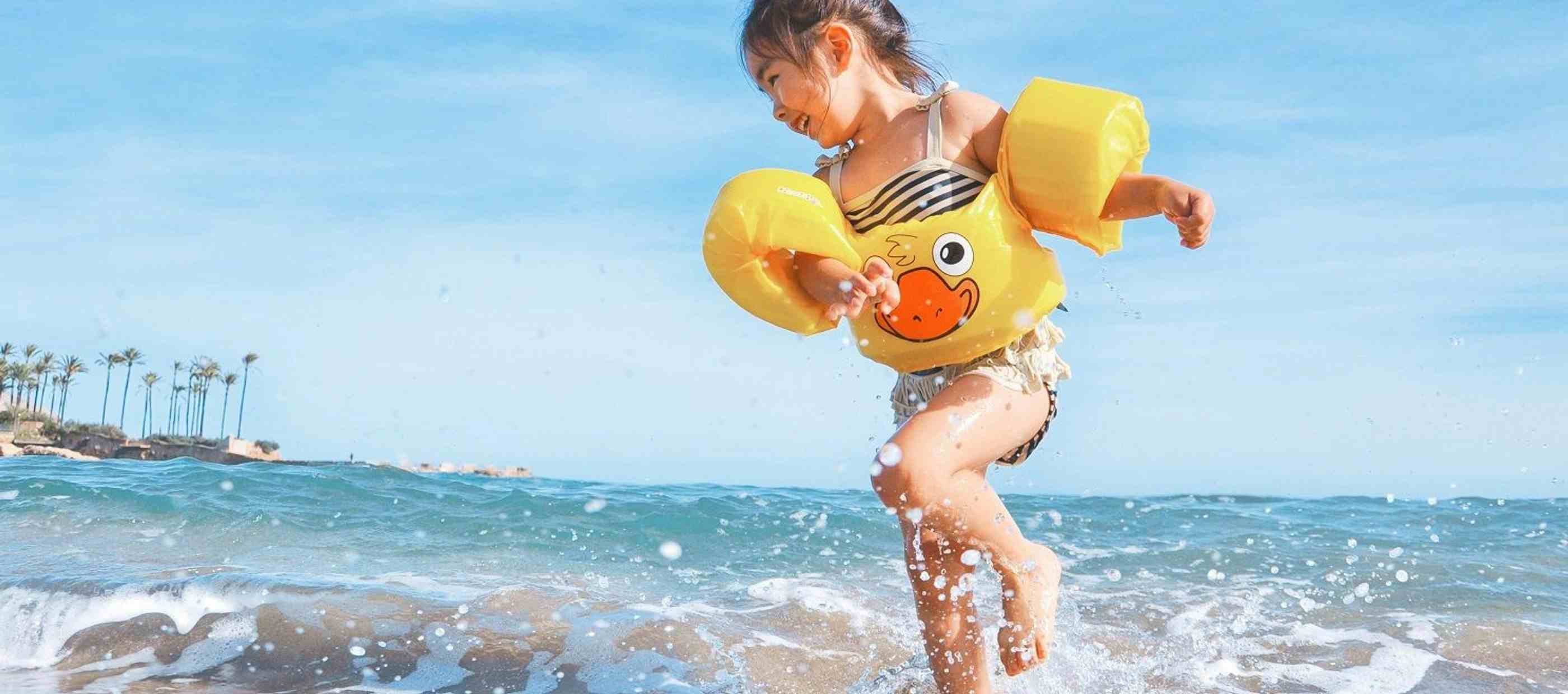Child splashing in the Ocean