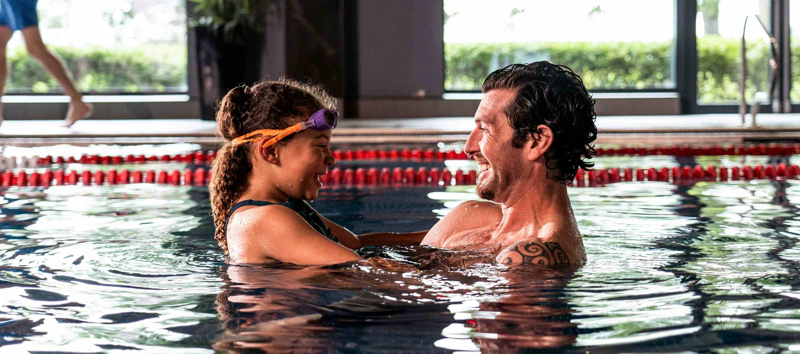 Father and Daughter swimming