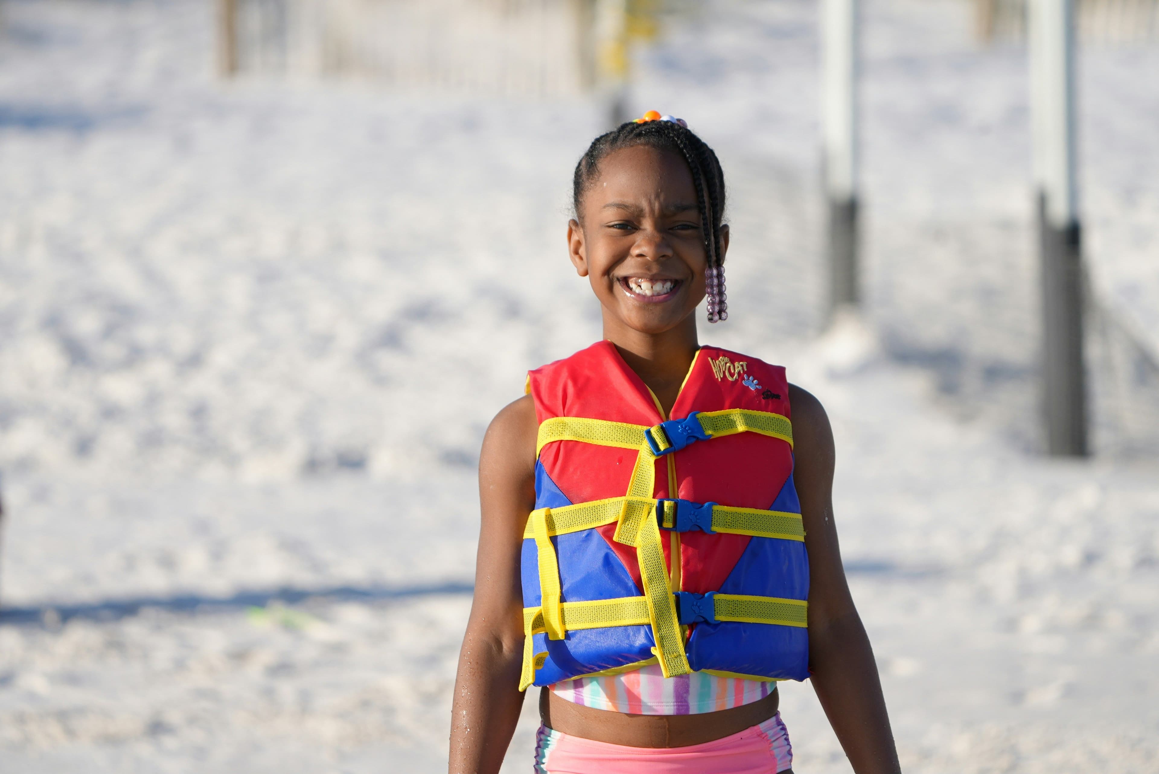 Child wearing life vest