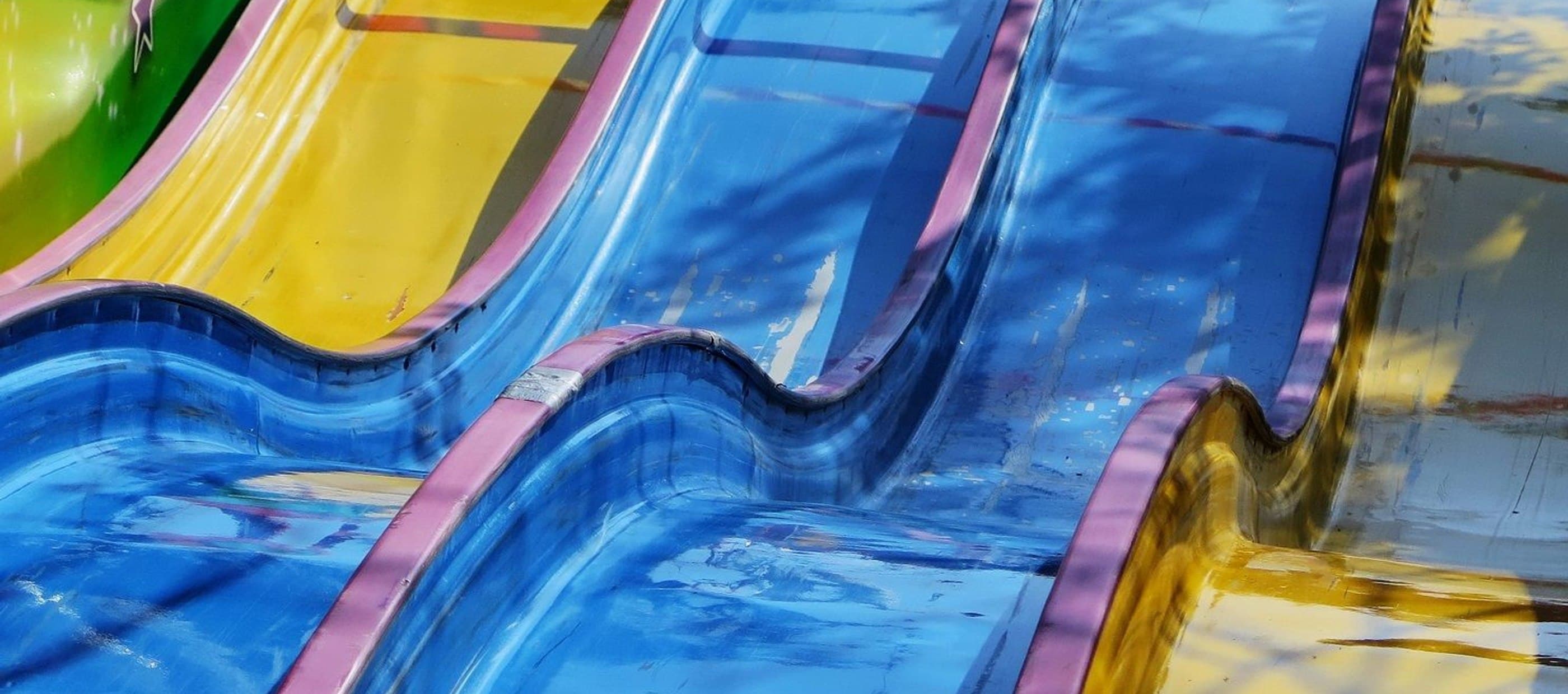 Different coloured water slides