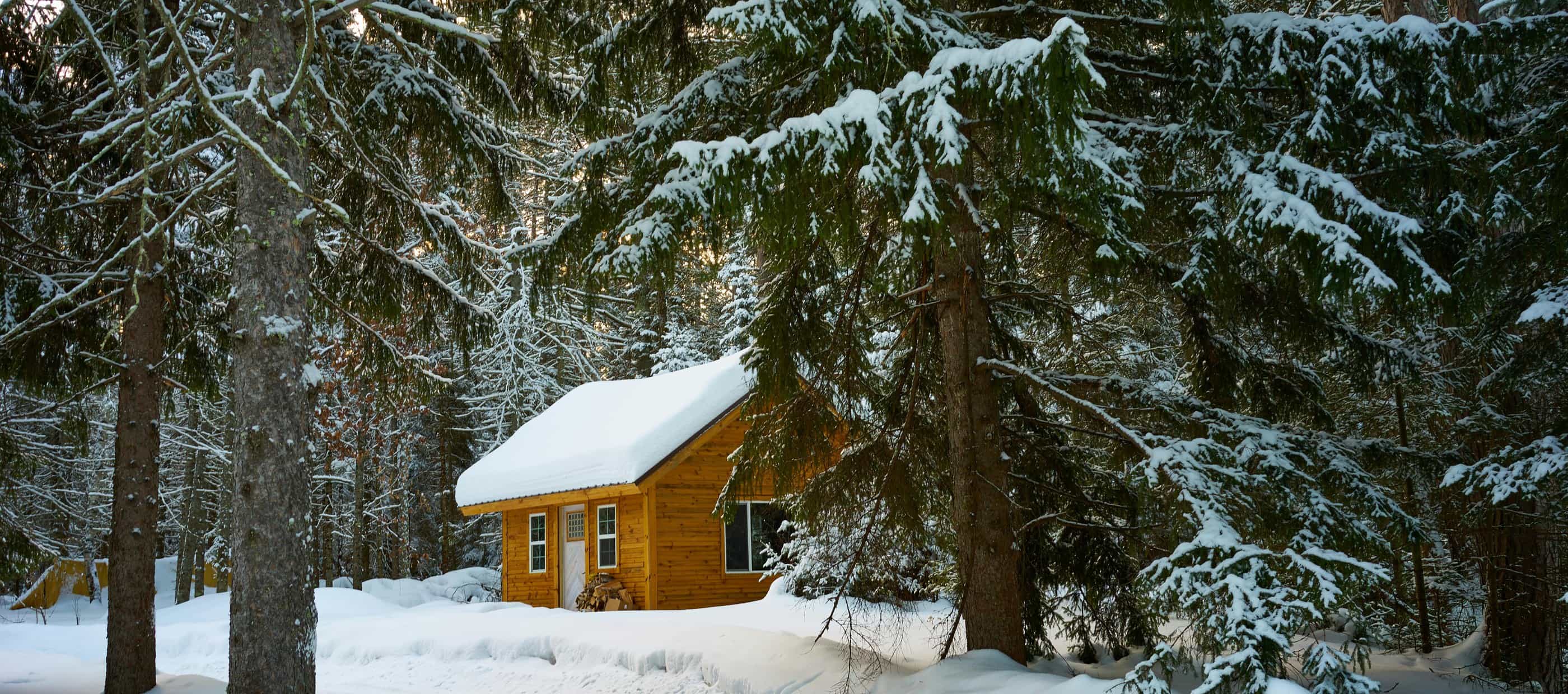 Snow covered cabin