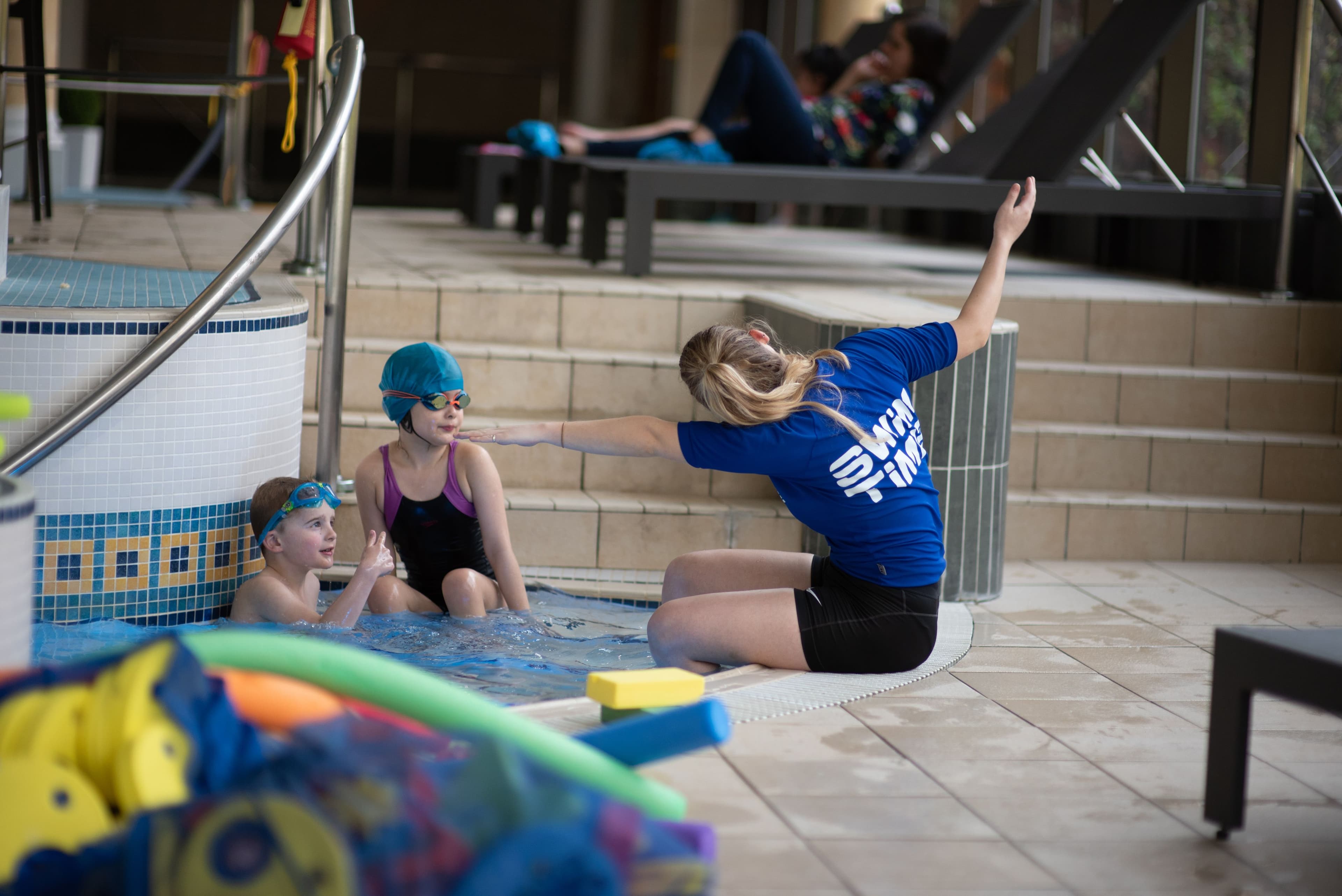 Instructor demonstrating to children